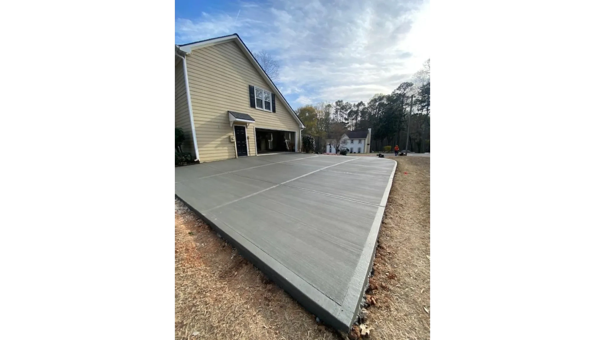 Circular concrete driveway installation in Wayne County, Michigan by Slab Happy Concrete