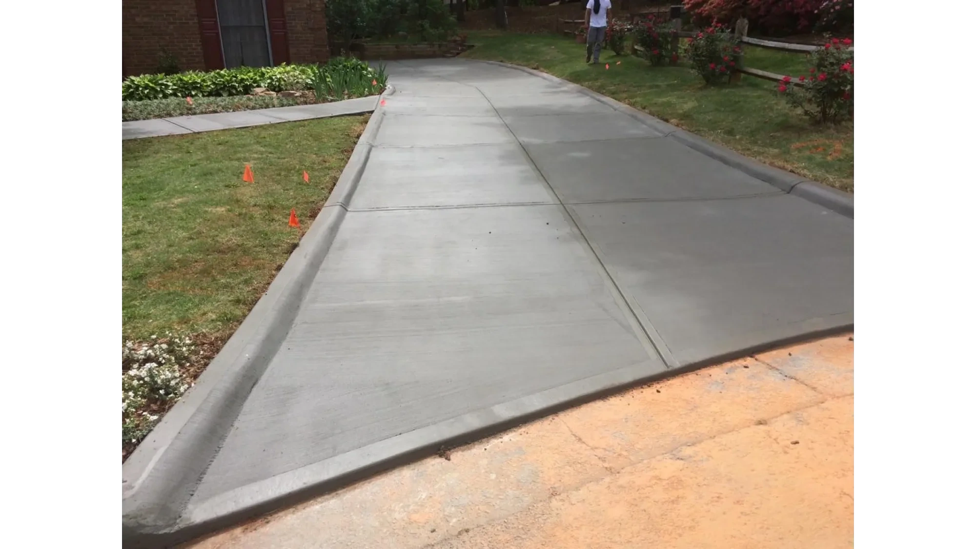 Concrete garage pad and driveway installation in Lapeer County, Michigan by Slab Happy Concrete